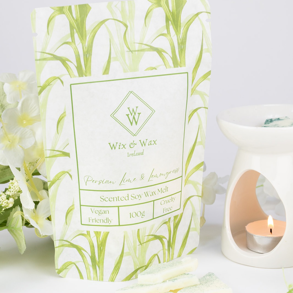 Persian Lime & Lemongrass soy wax melts hand made hand poured in ennis, co. clare, ireland. soy wax, eco friendly, vegan friendly, cruelty free. in a zesty yellow-green hue, handcrafted with soy wax and infused with a fresh, uplifting citrus aroma. irish made gifts ideas