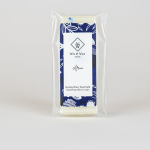 Africa wax melt by Wix and Wax – hand-poured soy blend with a fresh, masculine scent, styled in modern, eco-friendly packaging.