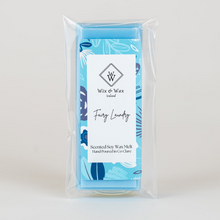 Load image into Gallery viewer, Fairy Laundry wax melt by Wix and Wax – hand-poured soy blend with a soft, clean baby-fresh scent, presented in eco-friendly, delicate packaging.
