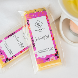 La Vie Est Belle wax melt by Wix and Wax – hand-poured soy blend with a sweet, floral perfume-inspired scent, presented in chic, eco-conscious packaging.
