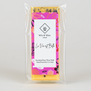 La Vie Est Belle wax melt by Wix and Wax – hand-poured soy blend with a sweet, floral perfume-inspired scent, presented in chic, eco-conscious packaging.