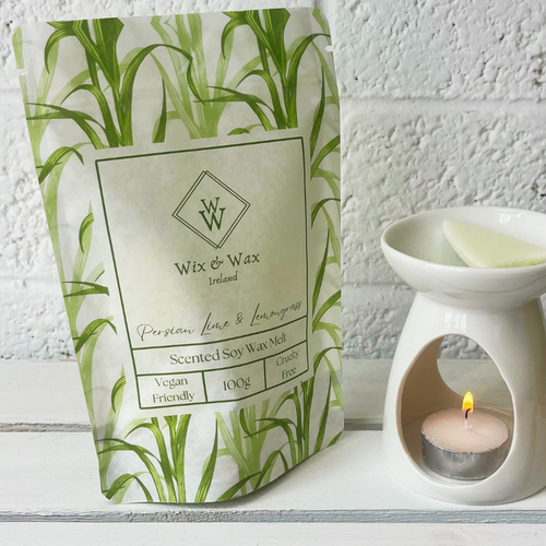 Persian Lime & Lemongrass wax melts in a zesty yellow-green hue, handcrafted with soy wax and infused with a fresh, uplifting citrus aroma.