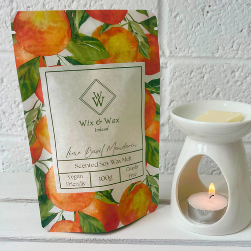 Lime, Basil & Mandarin wax melts in a fresh green shade, handcrafted with soy wax and featuring a crisp, aromatic citrus and herb fragrance.