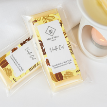 Load image into Gallery viewer, Vanilla Oud wax melt by Wix and Wax – hand-poured soy blend featuring a deep, warm vanilla and oud wood fragrance, presented in elegant, eco-friendly packaging.
